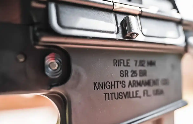 A SR-25 rifle lower.