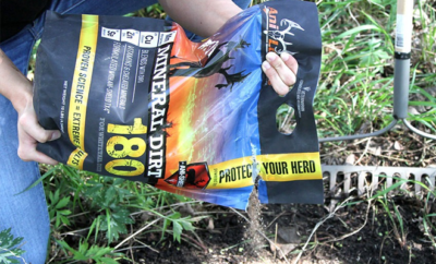 A person working their food plots.