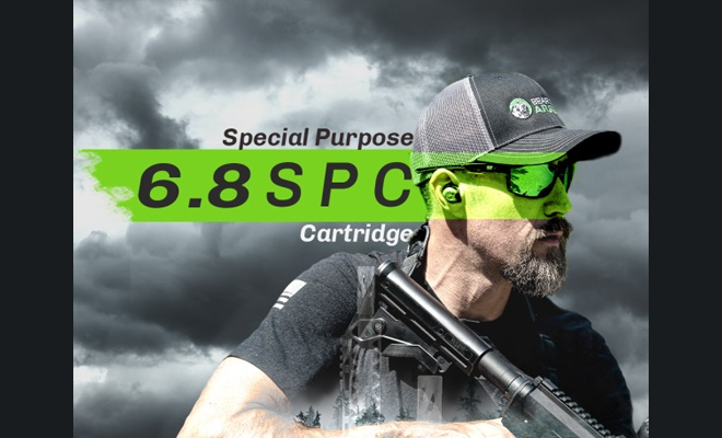A man holding a black rifle.