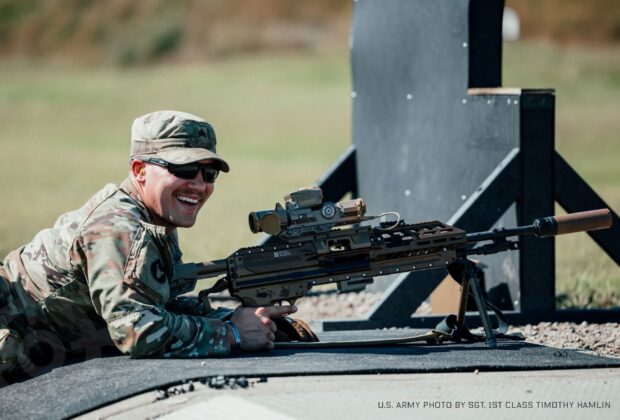 A soldier shooting a rifle from the prone position.