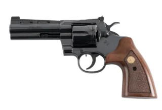 A Colt brand black revolver.