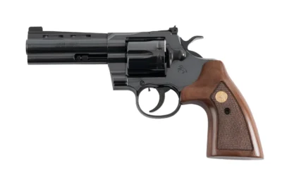 A Colt brand black revolver.